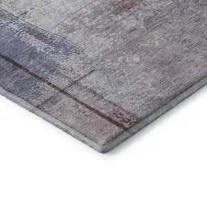 Photo of Lavender Gray And Ivory Abstract Washable Area Rug With UV Protection