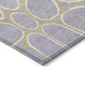 Photo of Lavender Ivory And Gold Abstract Washable Indoor Outdoor Area Rug