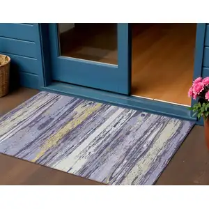 Photo of Lavender Ivory And Gold Striped Washable Indoor Outdoor Area Rug