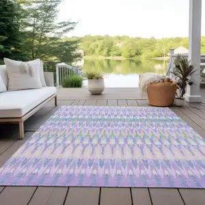 Photo of Lavender Pink And Lime Green Southwestern Washable Indoor Outdoor Area Rug