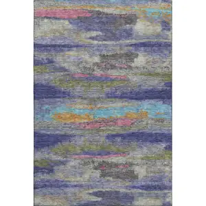 Photo of Lavender Pink And Orange Abstract Washable Area Rug With UV Protection