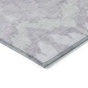 Photo of Lavender Purple And Gray Ikat Washable Indoor Outdoor Area Rug