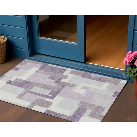 Lavender Purple And Ivory Abstract Washable Indoor Outdoor Area Rug Photo 1