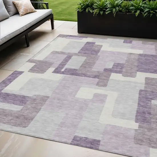 Lavender Purple And Ivory Abstract Washable Indoor Outdoor Area Rug Photo 1