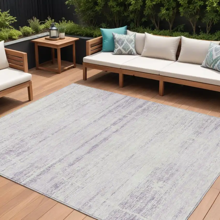 Lavender Purple And Ivory Abstract Washable Indoor Outdoor Area Rug Photo 1