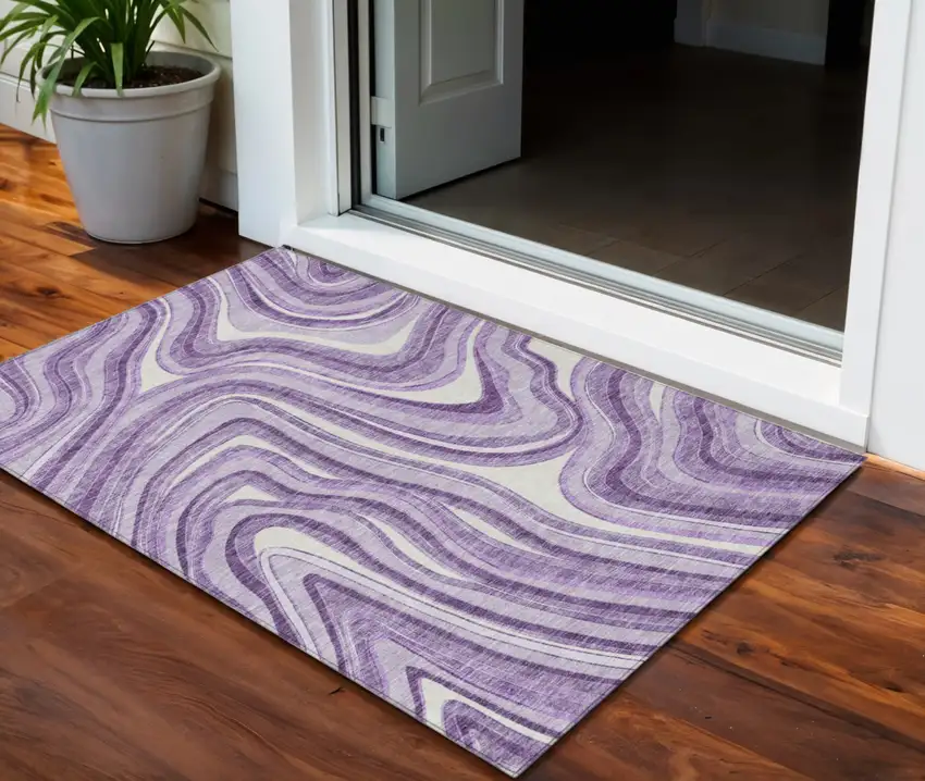 Lavender Purple And Ivory Abstract Washable Indoor Outdoor Area Rug Photo 1