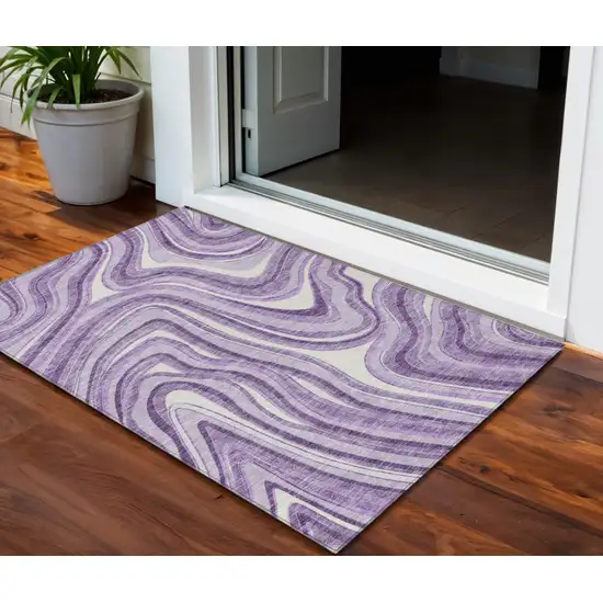 Lavender Purple And Ivory Abstract Washable Indoor Outdoor Area Rug Photo 1