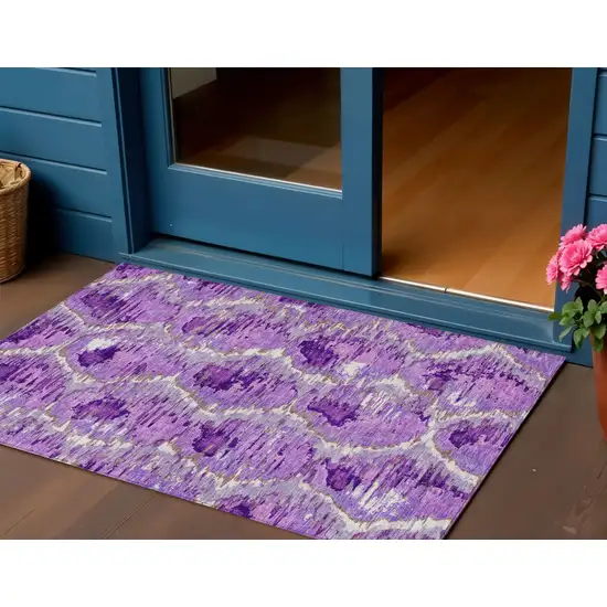 Lavender Purple And Ivory Abstract Washable Indoor Outdoor Area Rug Photo 1