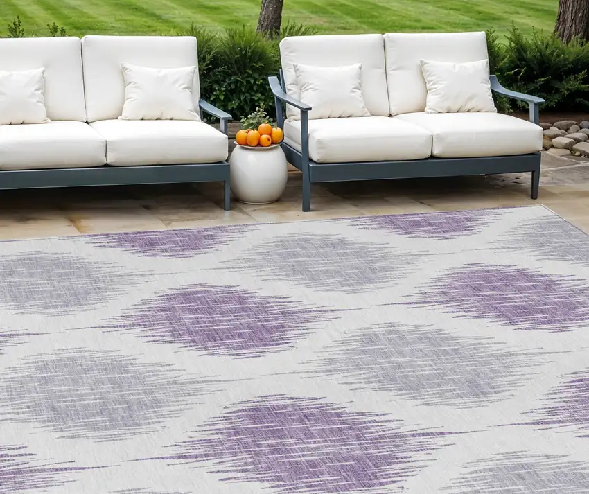 Lavender Purple And Ivory Ikat Washable Indoor Outdoor Area Rug Photo 1
