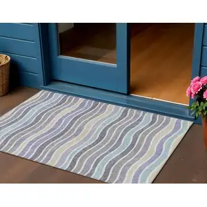 Photo of Lavender Tan And Ivory Striped Washable Indoor Outdoor Area Rug