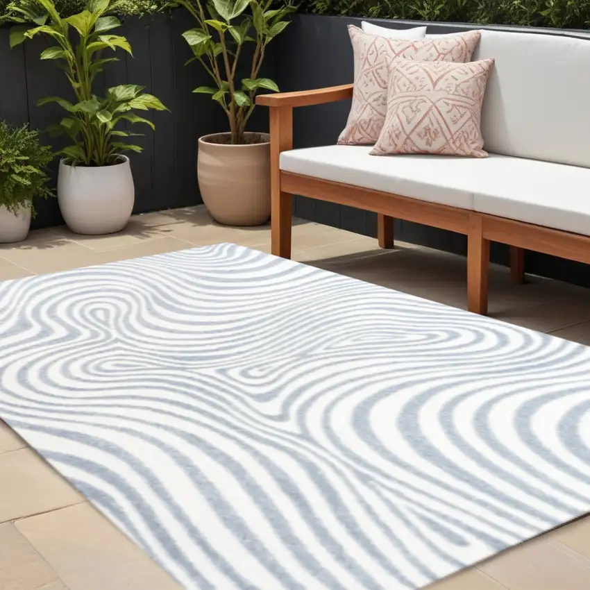 Light Blue And Ivory Abstract Indoor Outdoor Area Rug Photo 1