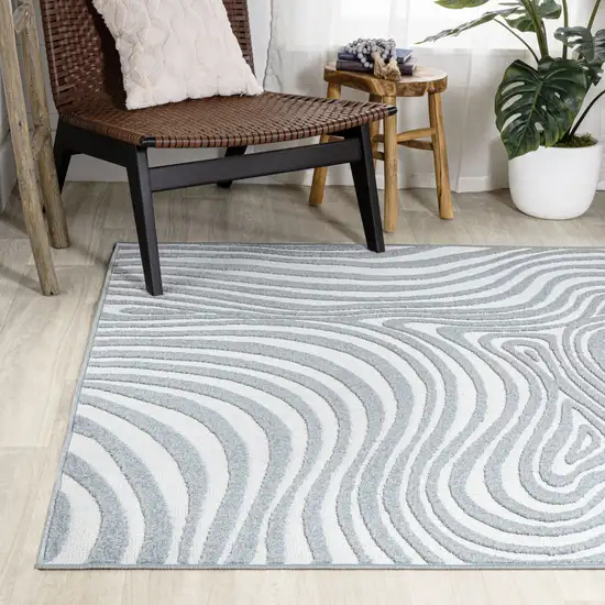 Light Blue And Ivory Abstract Indoor Outdoor Area Rug Photo 7