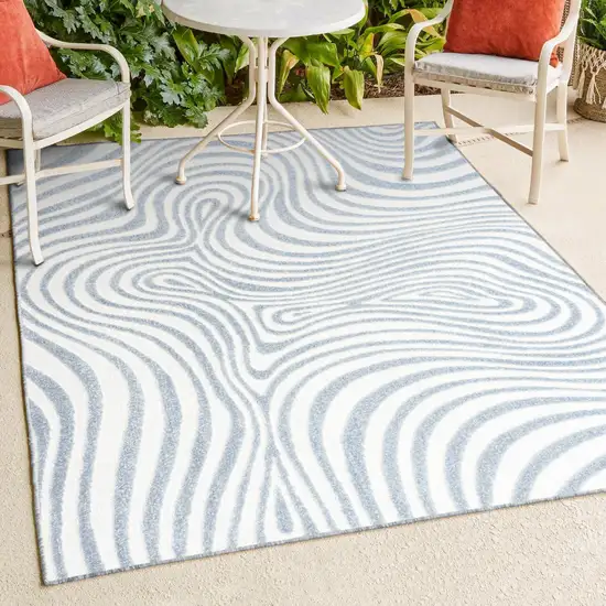 Light Blue And Ivory Abstract Indoor Outdoor Area Rug Photo 9
