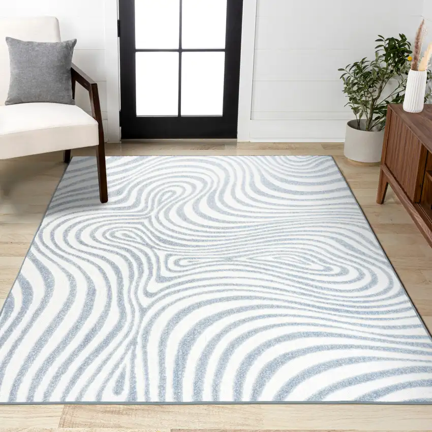 Light Blue And Ivory Abstract Indoor Outdoor Area Rug Photo 8