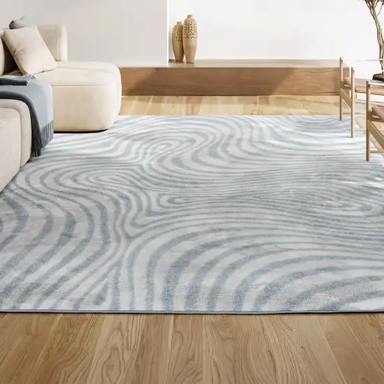 Light Blue And Ivory Abstract Indoor Outdoor Area Rug Photo 5
