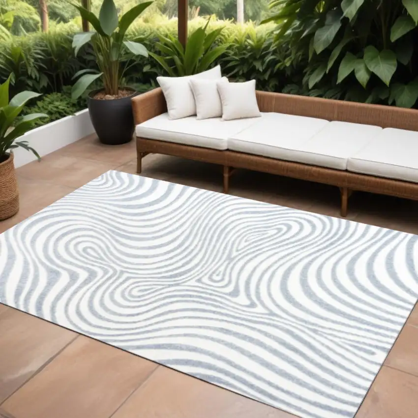 Light Blue And Ivory Abstract Indoor Outdoor Area Rug Photo 1