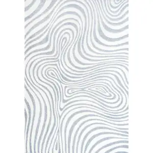 Photo of Light Blue And Ivory Abstract Indoor Outdoor Area Rug
