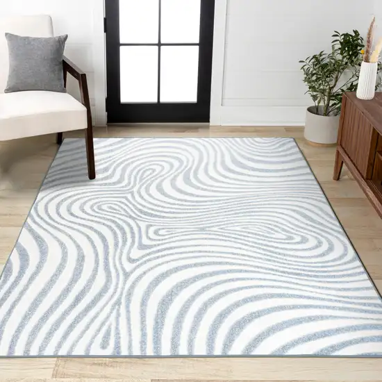 Light Blue And Ivory Abstract Indoor Outdoor Area Rug Photo 8