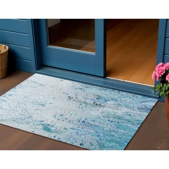 Light Blue And Ivory Abstract Washable Indoor Outdoor Area Rug Photo 1