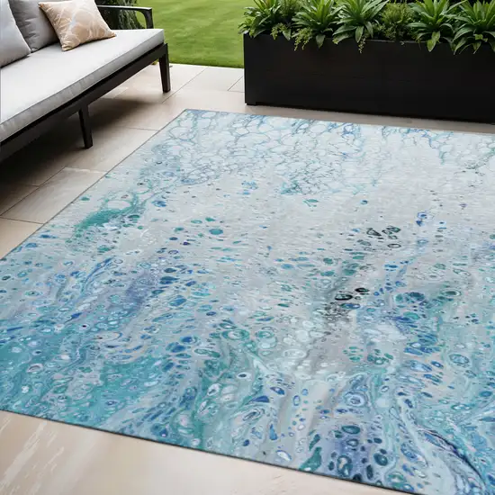 Light Blue And Ivory Abstract Washable Indoor Outdoor Area Rug Photo 1