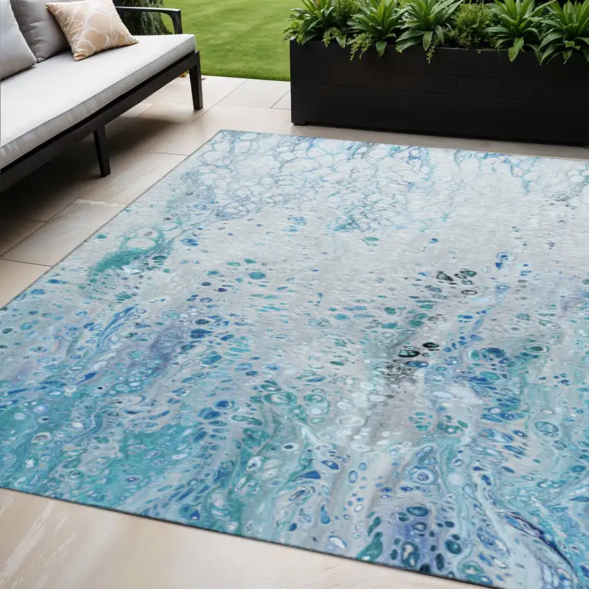 Light Blue And Ivory Abstract Washable Indoor Outdoor Area Rug Photo 1