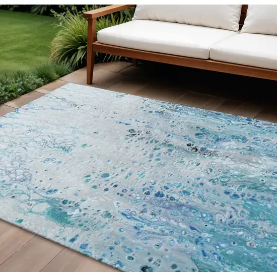 Light Blue And Ivory Abstract Washable Indoor Outdoor Area Rug Photo 1
