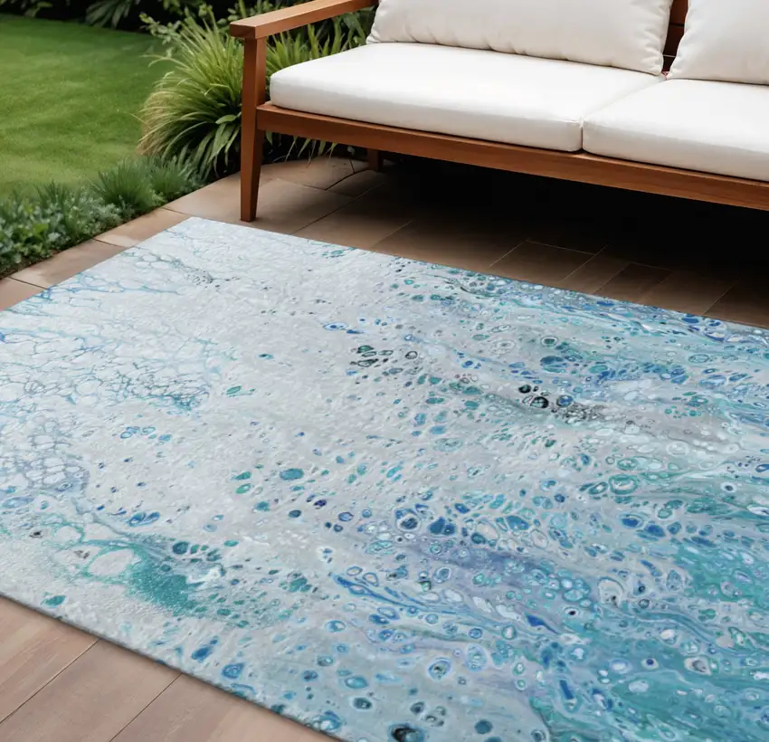 Light Blue And Ivory Abstract Washable Indoor Outdoor Area Rug Photo 1