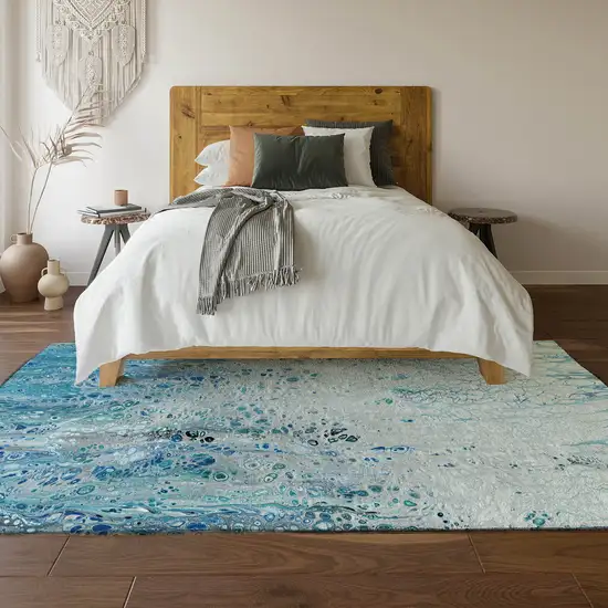 Light Blue And Ivory Abstract Washable Indoor Outdoor Area Rug Photo 6