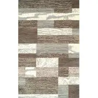 Photo of Light Blue And Ivory Patchwork Power Loom Stain Resistant Area Rug
