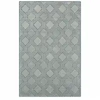 Photo of Light Blue And Navy Geometric Stain Resistant Area Rug