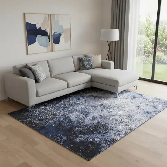 Light Blue Black And Ivory Abstract Non Skid Area Rug Photo 1