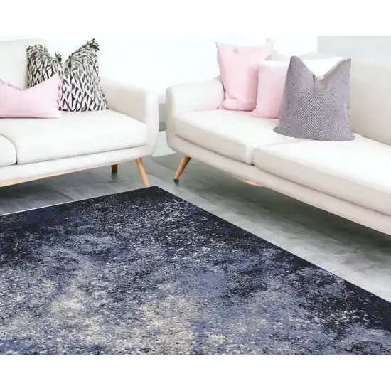 Light Blue Black And Ivory Abstract Non Skid Area Rug Photo 1