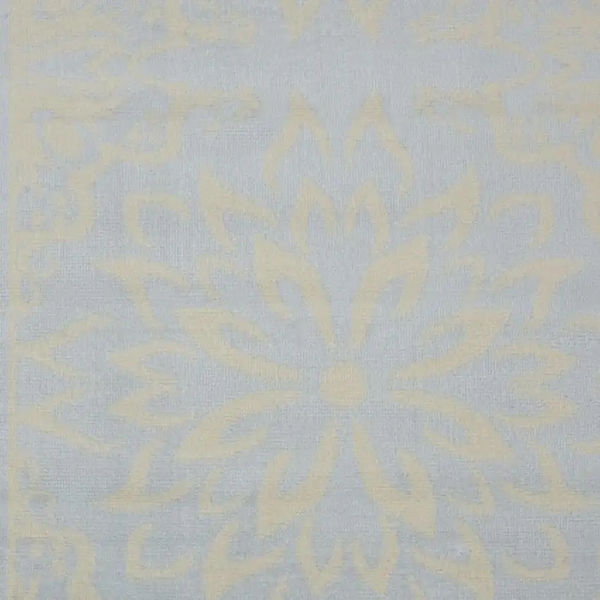 Light Blue Floral Power Loom Area Rug Photo 1