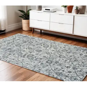 Photo of Light Blue Floral Power Loom Area Rug
