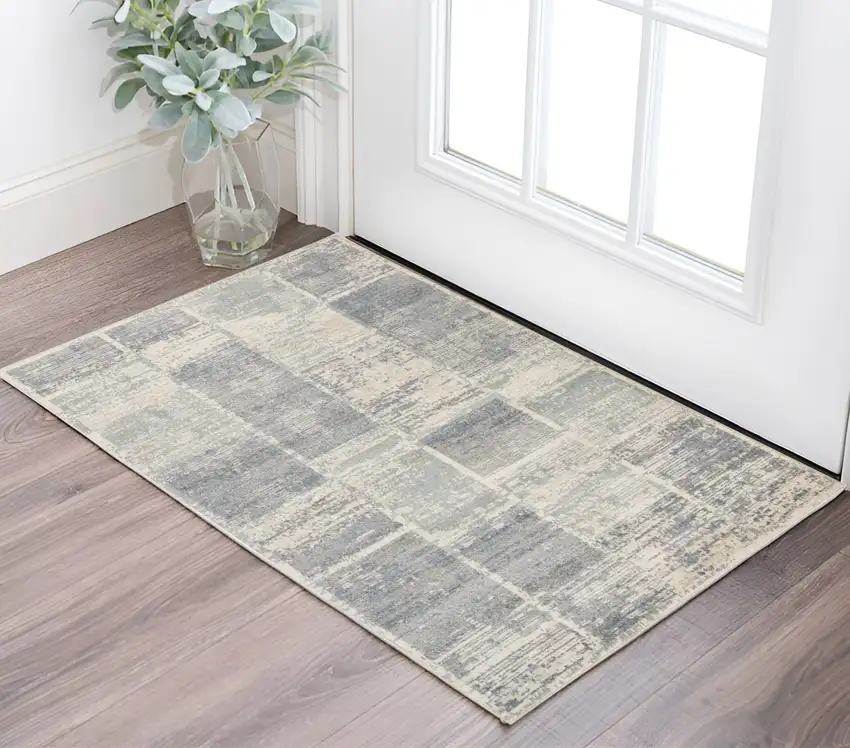 Gray and Light Blue Geometric Power Loom Area Rug Photo 1