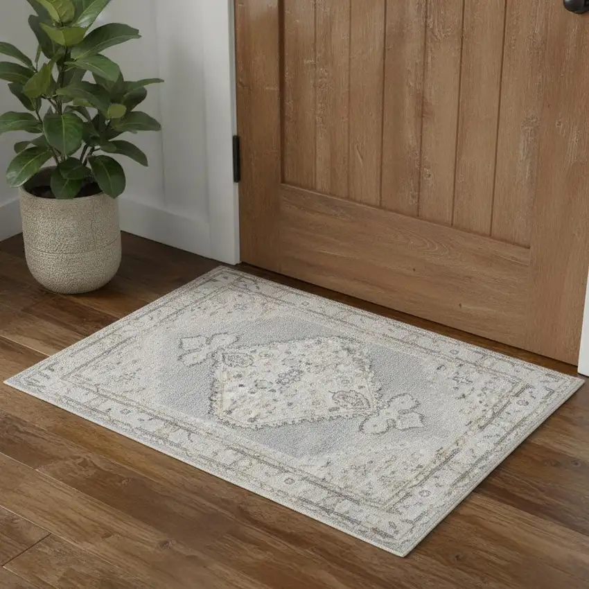 Light Blue Ivory And Brown Floral Medallion Distressed Washable Area Rug Photo 1