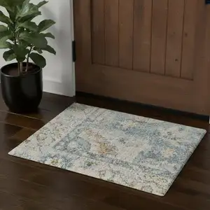 Photo of Light Blue Ivory And Yellow Floral Medallion Washable Area Rug