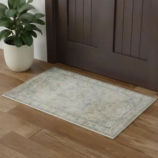 Light Blue Ivory And Yellow Floral Medallion Washable Area Rug Photo 1