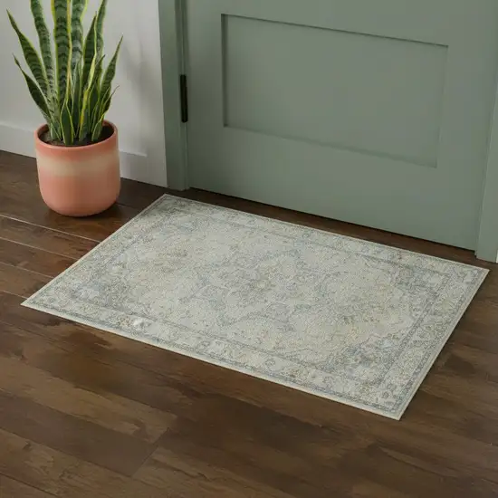 Light Blue Ivory And Yellow Floral Medallion Washable Area Rug Photo 1