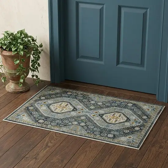 Light Blue Navy Gold Ivory And Grey Oriental Power Loom Stain Resistant Area Rug With Fringe Photo 1