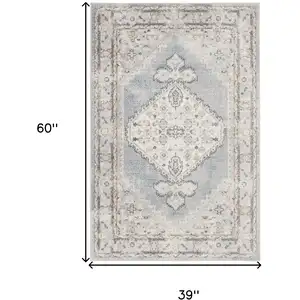 Photo of Light Blue Oriental Power Loom Distressed Washable Area Rug