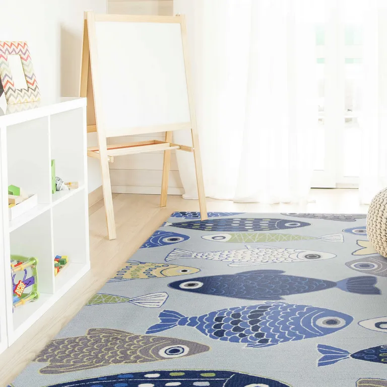 Light Blue School of Fish Indoor Area Rug Photo 1