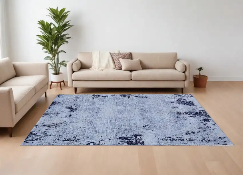 Light Blue and Black Abstract Power Loom Area Rug Photo 1