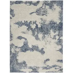 Photo of Light Blue and Ivory Abstract Non Skid Area Rug
