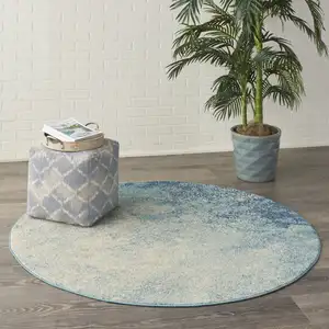 Photo of Light Blue and Ivory Abstract Sky Area Rug