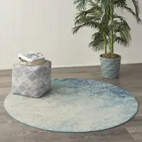 Photo of Light Blue and Ivory Abstract Sky Area Rug