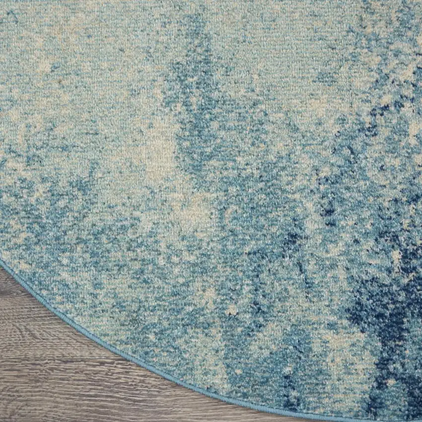 8' Blue And Ivory Abstract Round Rug Photo 8