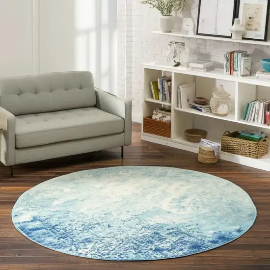 8' Blue And Ivory Abstract Round Rug Photo 1