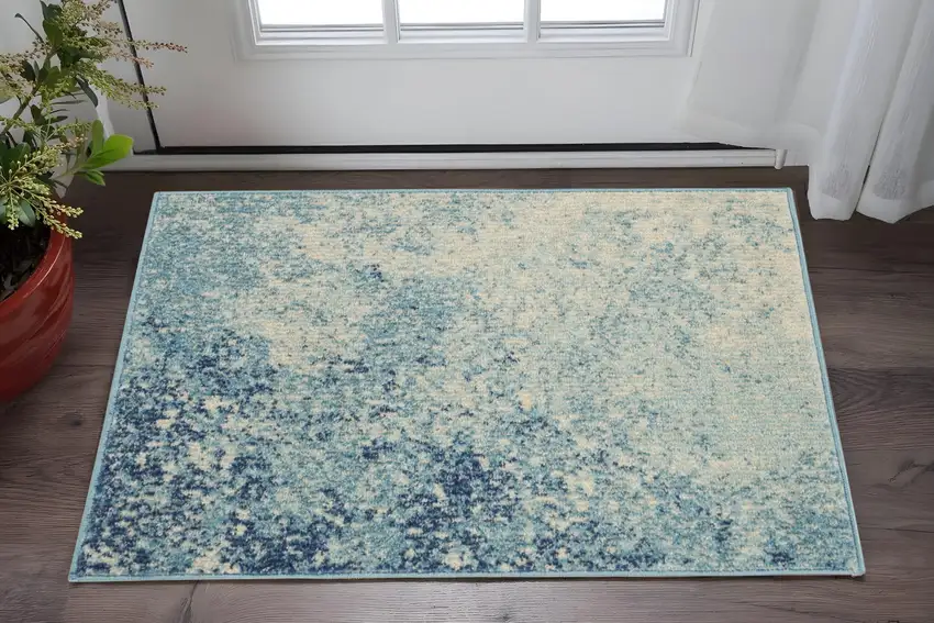 Blue And Ivory Abstract Area Rug Photo 1