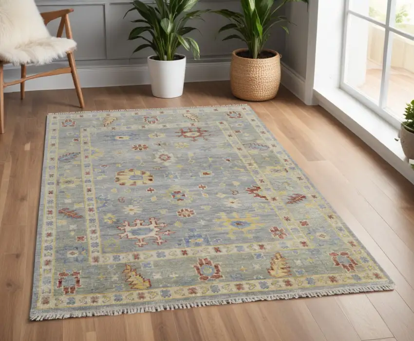 Light Blue and Taupe Wool Floral Hand Knotted Area Rug With Fringe Photo 1